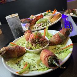 The Cantinita - Wrapped jalapeños guacamole and rib eye chunks