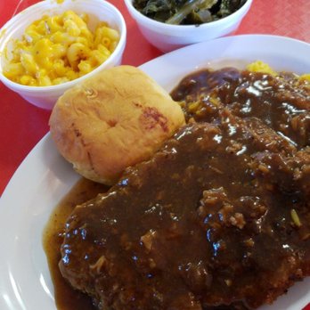 Big Daddy's Kitchen - Smothered pork chops, yellow rice, mac&cheese and collard greens - Soul Food Near Me - Atlanta, Georgia