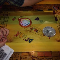 Treehouse Shine Bar An Grill - Drinking games on the table.