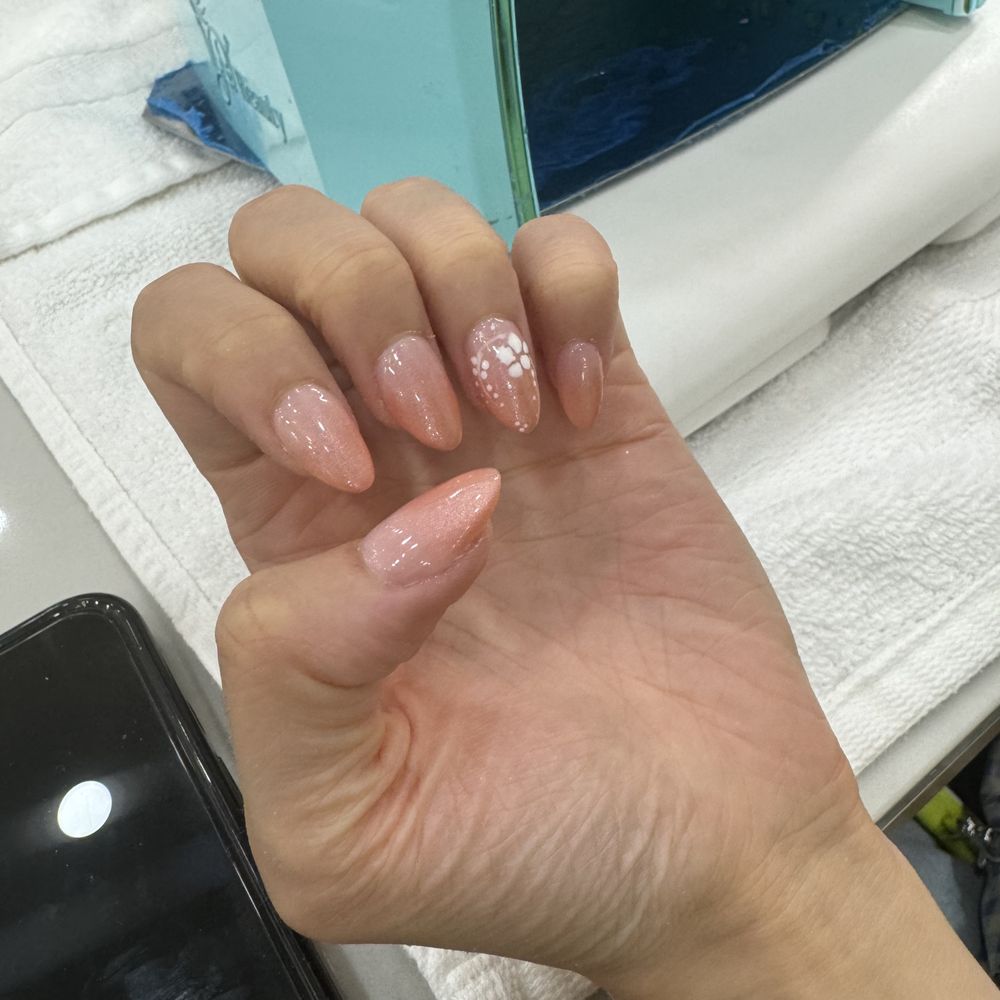 Elegance Nails & Spa - Gel X ombre nails with flower design on the ring finger by Yen - Nail Salons Near Me - Mountain View, California Elegance Nails & Spa - Gel X ombre nails with flower design on the ring finger by Yen - Nail Salons Near Me - Mountain View, California