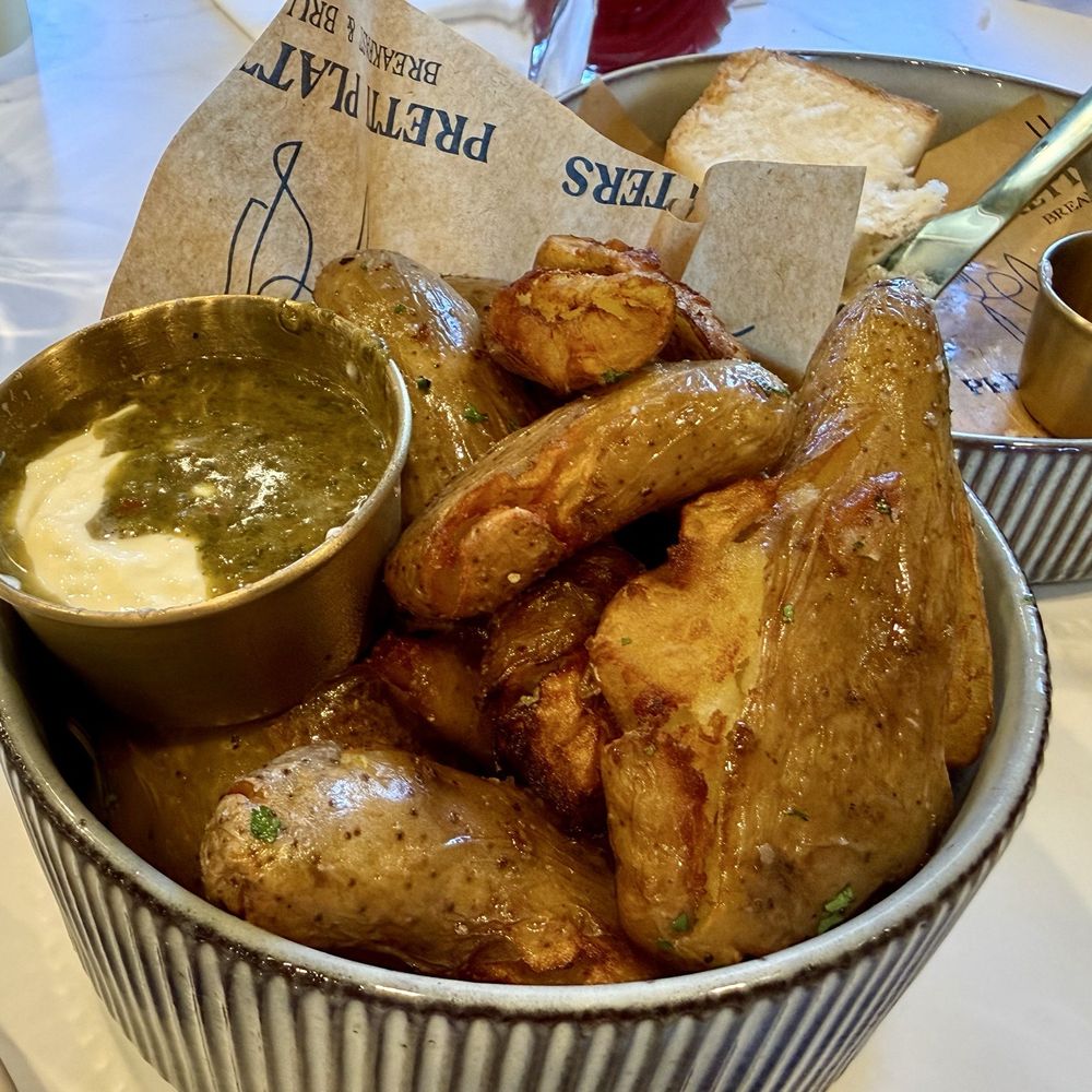 Pretti Platters - Crispy potatoes with garlic aioli & salsa verde sauce - Breakfast & Brunch Near Me - San Anselmo, California Pretti Platters - Crispy potatoes with garlic aioli & salsa verde sauce - Breakfast & Brunch Near Me - San Anselmo, California