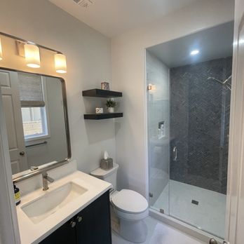 One Stop Builders - Full size bath attached to an office. - General Contractors Near Me