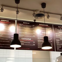 Bienmesabe - Menu March 2025. Arepa #2 is shredded chicken and #3 is roast pork
