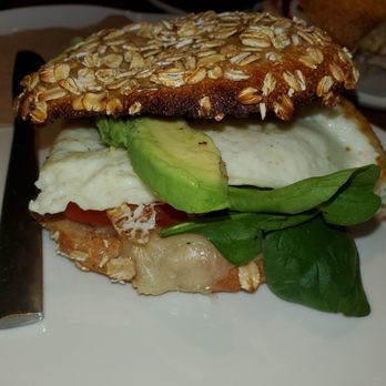 Panera Bread - Egg white, spinach, avocado Sandwich on a whole grain roll with sweet maple sauce and tomato - Sandwiches Near Me - Basking Ridge, New Jersey