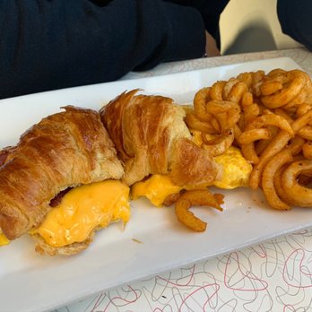 Jackson Hole - Bacon, egg and cheese on a croissant with curly fries - Burgers Near Me - East Elmhurst, New York Jackson Hole - Bacon, egg and cheese on a croissant with curly fries - Burgers Near Me - East Elmhurst, New York