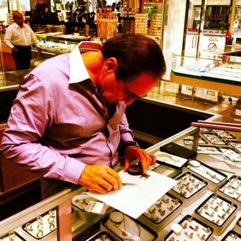 The Diamond Outlet  - Hand selecting each stone to finish a design. Too cool - Jewelry Near Me - Los Angeles, California