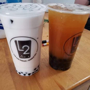 L2 - two drinks sitting on a table - Bubble Tea Near Me - Montreal, Quebec L2 - two drinks sitting on a table - Bubble Tea Near Me - Montreal, Quebec