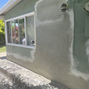 Fermin Marroquin Stucco - Adding the weep screed and fixing a hole left from the window AC unit. - Stucco Services Near Me