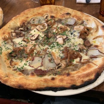 Taverna Mercatto - Bianca pizza with potatoes, mushrooms and caramelized onions - Italian Near Me - Toronto, Ontario Taverna Mercatto - Bianca pizza with potatoes, mushrooms and caramelized onions - Italian Near Me - Toronto, Ontario