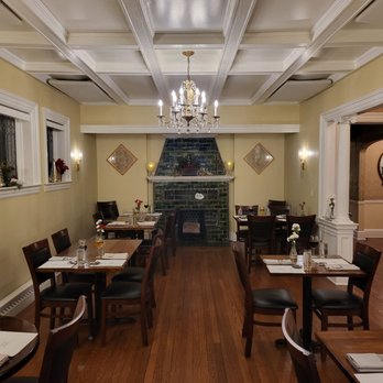 Revival on Lincoln - a dining room with a fireplace - New American Near Me - Pittsburgh, Pennsylvania Revival on Lincoln - a dining room with a fireplace - New American Near Me - Pittsburgh, Pennsylvania