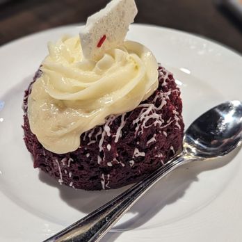 Docs Bar & Grill - a red velvet cupcake with whipped cream - American Near Me - Monkey Island, Oklahoma