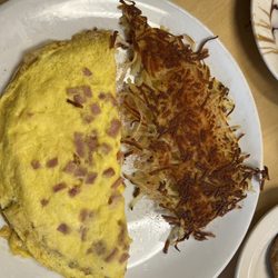 The Breakfast SPOT - Ham and cheese omelet with hash browns.