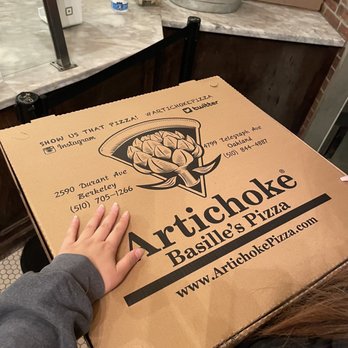 Artichoke Basille's Pizza - The big pizza box to hand comparison - Pizza Near Me - Berkeley, California