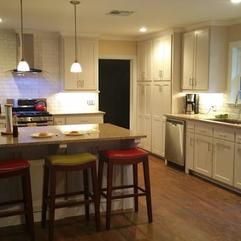 Drenko Contractors - a kitchen with a center island - General Contractors Near Me - Lafayette, Louisiana