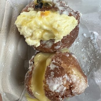 Manuela Malasada - Lilikoi filled and Bavarian filled (cut and filling in top, not throughout malasada) - Donuts Near Me - Kahului , Hawaii