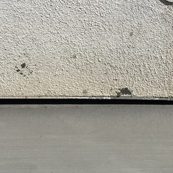 Daniel's Concrete - Cement/Concrete splashes on our white stucco house - Masonry/Concrete Near Me - Pomona, California Daniel's Concrete - Cement/Concrete splashes on our white stucco house - Masonry/Concrete Near Me - Pomona, California