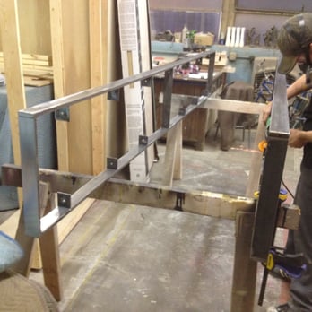 Make - A shop assistant grinding away on a project - Furniture Reupholstery Near Me - Chicago, Illinois