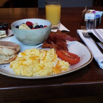Walker Street Kitchen - American breakfast. Scrambled eggs with cheese, bacon, and a toasted English muffin. Substituted fruit for hashbrowns. - New American Near Me - Houston, Texas