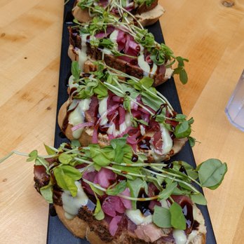 Down the Hatch Maui - Ahi Samurai. $17.49. Black pepper seared ahi, avocado hummus, pickled red onion, wasabi aioli, balsamic glaze, sprouts, crostini. - Seafood Near Me - Lahaina, Hawaii