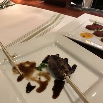 Seasons 52 - Lamb lollipops to in a serving. - New American Near Me - Mclean, Virginia