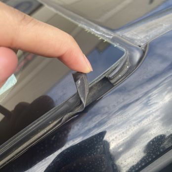 KD Auto Glass - Before: Loose stripping and no bonding on corner of windshield from previous service. - Auto Glass Services Near Me - Ontario, California KD Auto Glass - Before: Loose stripping and no bonding on corner of windshield from previous service. - Auto Glass Services Near Me - Ontario, California