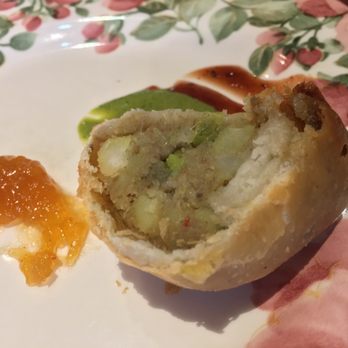 Cafe Lotus - Vegetable samosa cut in half. Stuffed wth potatoes and seasoning. Try the sauces with it too! - Indian Near Me - Fairfax, California Cafe Lotus - Vegetable samosa cut in half. Stuffed wth potatoes and seasoning. Try the sauces with it too! - Indian Near Me - Fairfax, California
