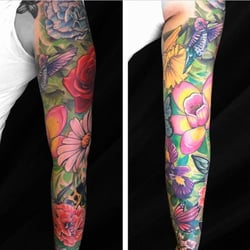 Golden Rooster Tattoo Parlor - Full flower sleeve done by Chris Holbert
Number to make an appointment: (760) 948-1420