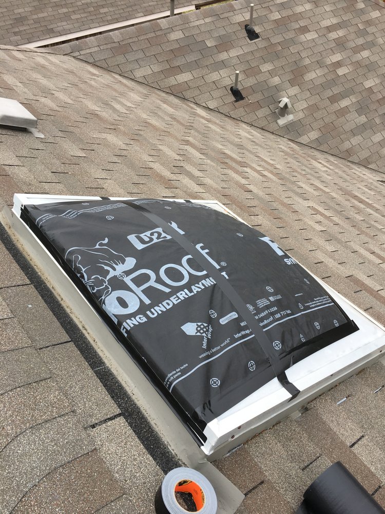 Slide of DNA Roofing & Construction