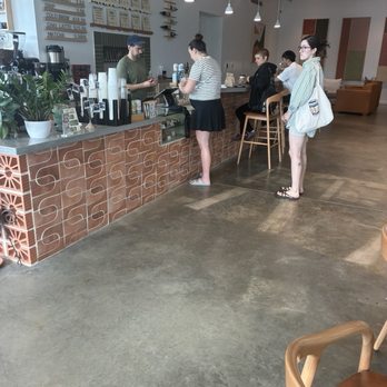 Switchback Coffee and Beer - Interior shot showing customers ordering - Coffee & Tea Near Me - Austin, Texas