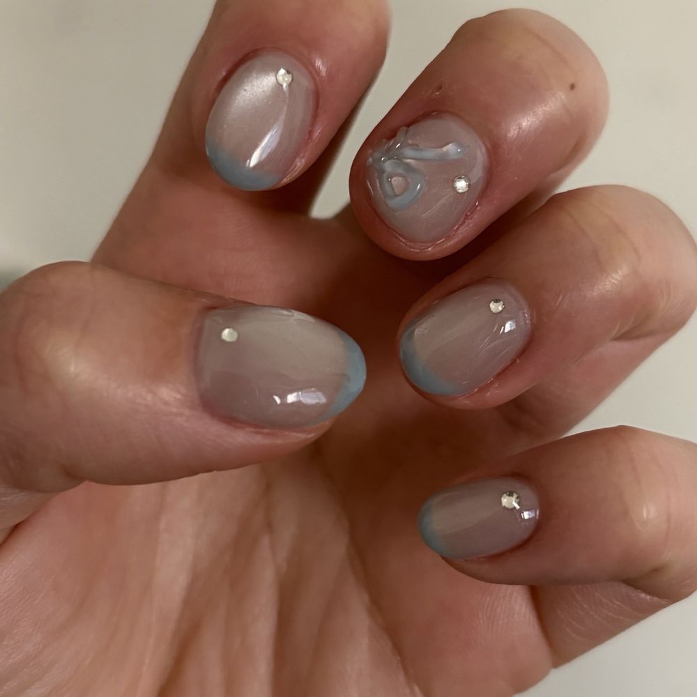 Buttercup by Haru - cat-eye french nails with bow and gem - Nail Salons Near Me - Los Angeles, California Buttercup by Haru - cat-eye french nails with bow and gem - Nail Salons Near Me - Los Angeles, California