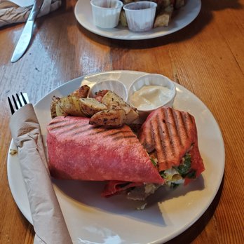 Common Loaf Bake Shop - Breakfast burritos...mine is with sausage and my sis got the vegetarian version - Bakeries Near Me - Tofino, British Columbia