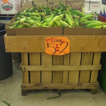Elmora Farmer's Market - a display of green bananas - Farmers Market Near Me - Elizabeth, New Jersey Elmora Farmer's Market - a display of green bananas - Farmers Market Near Me - Elizabeth, New Jersey