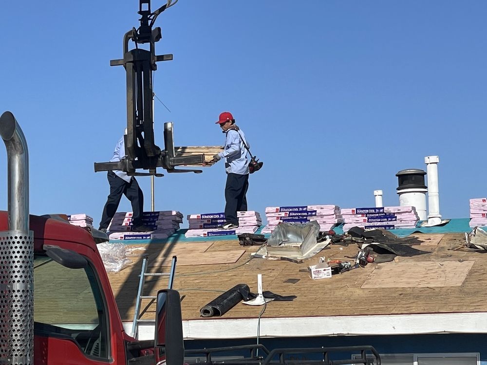 Slide of Elite Roofing