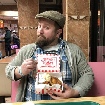 Hollywood Fried Chicken - a man holding a box of fried chicken - Chicken Shop Near Me - Jersey City, New Jersey Hollywood Fried Chicken - a man holding a box of fried chicken - Chicken Shop Near Me - Jersey City, New Jersey
