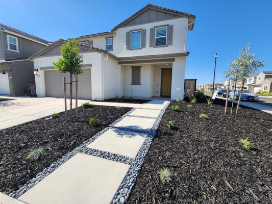 Front Yard Xeriscape Modern Roseville Landscape - A beautifully designed modern front yard. Complete with mulch, curb appeal, irrigation, floating pavers, and decorative rock. Give us a call at 916-918-3990 or go to http://www.reliablelandscapesdesign.com/ to get a start on your 3D design and outdoor living renovation! Front Yard Xeriscape Modern Roseville Landscape - A beautifully designed modern front yard. Complete with mulch, curb appeal, irrigation, floating pavers, and decorative rock. Give us a call at 916-918-3990 or go to http://www.reliablelandscapesdesign.com/ to get a start on your 3D design and outdoor living renovation!