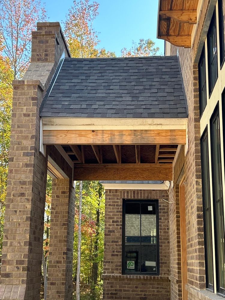 Slide of Dos Amigos Roofing