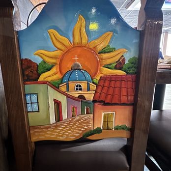 Vallarta - a sunflower painted on the back of a chair - Tacos Near Me - Salem, New Hampshire