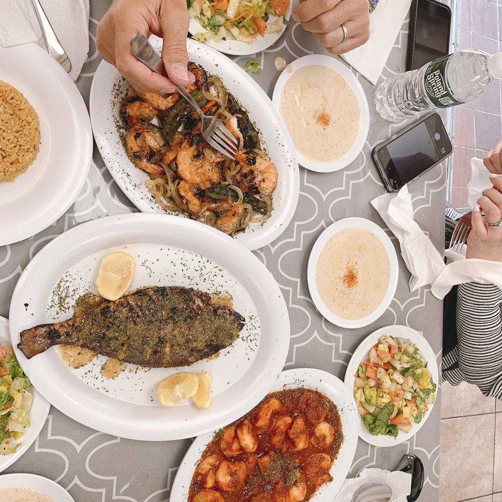 Samakmak Seafood - a table full of food - Mediterranean Near Me - Jersey City, New Jersey