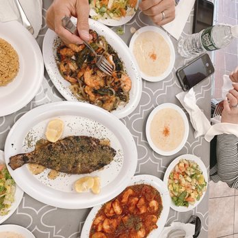 Samakmak Seafood - a table full of food - Mediterranean Near Me - Jersey City, New Jersey Samakmak Seafood - a table full of food - Mediterranean Near Me - Jersey City, New Jersey