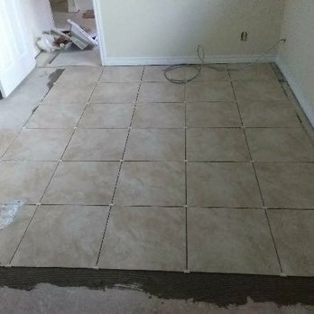 Grace Building Maintenance - a tile floor being laid - Office Cleaning Near Me - Lafayette, Louisiana