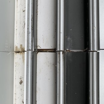 Weather Tite Windows - Seam where water is leaking and going under the floor and popping up Tile and grout! - Windows Installation Near Me - Tampa, Florida