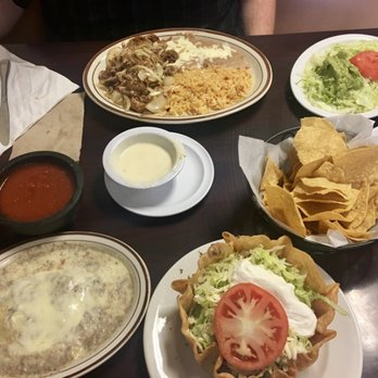 El Campero - Chile relleno, salsa, queso, pork carnitas dinner (comes with the plate of veggies and guac), chips, taco salad w/ ground beef + no guac - Mexican Near Me - Canton, Ohio