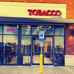 Exterior outside entrance of Tobacco Grove - Store Front - Linden, New Jersey Exterior outside entrance of Tobacco Grove - Store Front - Linden, New Jersey