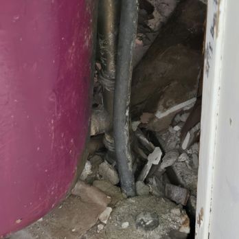 Action Plumbing Heating Air Conditioning and Electric - You can see the hole in the floor in the front. It goes all the way back, but is filled with broken wall. - Plumbing Near Me - Madison, Wisconsin Action Plumbing Heating Air Conditioning and Electric - You can see the hole in the floor in the front. It goes all the way back, but is filled with broken wall. - Plumbing Near Me - Madison, Wisconsin