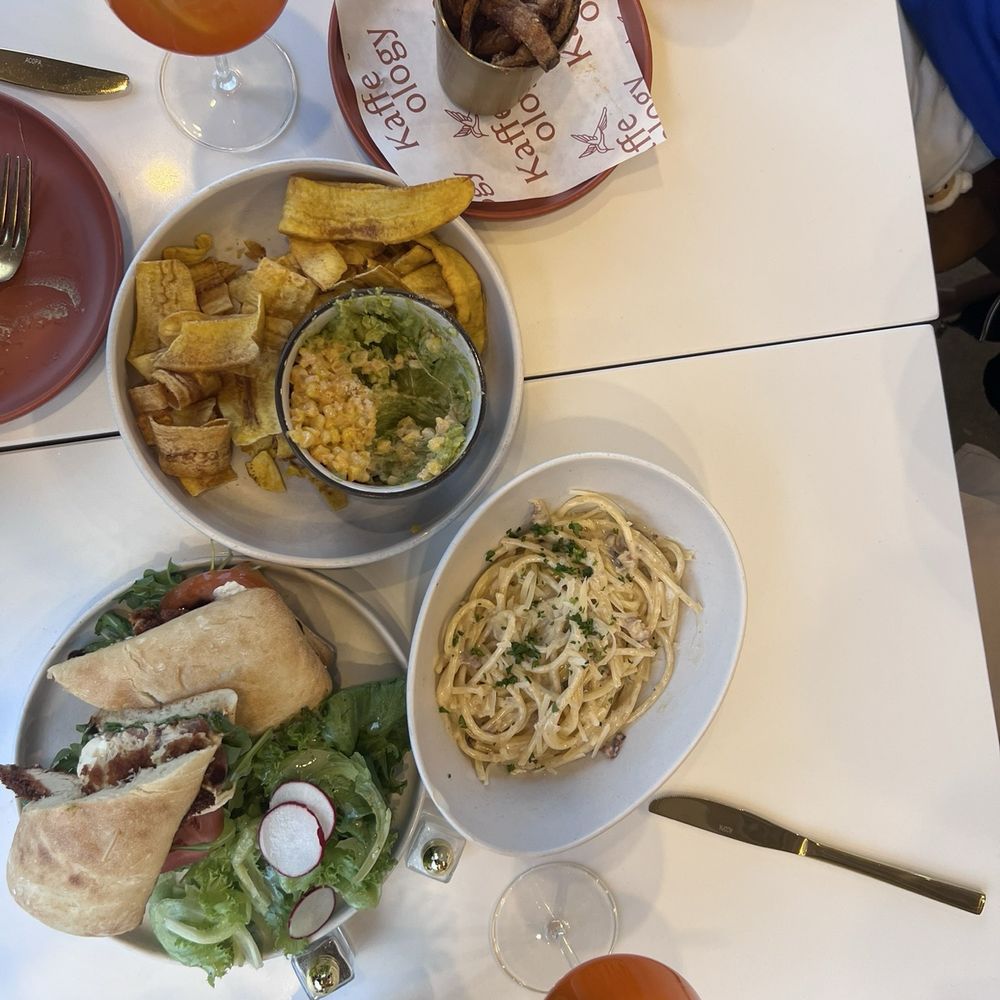 Burrata Caprese Sandwich, Street Corn Guacamole, fries, breakfast carbonara, and aperol spritz Burrata Caprese Sandwich, Street Corn Guacamole, fries, breakfast carbonara, and aperol spritz
