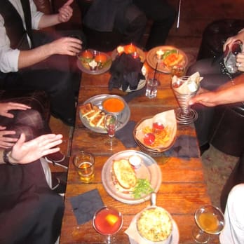 The Edison - An assortment of dishes for dinner. - Cocktail Bars Near Me - Los Angeles, California