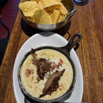 North Side Tavern Restaurant - Colorado Cast Iron Cheese dip with Carnitas - American Near Me - Broomfield, Colorado North Side Tavern Restaurant - Colorado Cast Iron Cheese dip with Carnitas - American Near Me - Broomfield, Colorado