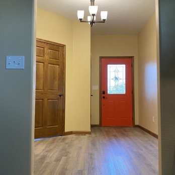 Construction Plus - a hallway with a red door - General Contractors Near Me - Sioux City, South Dakota Construction Plus - a hallway with a red door - General Contractors Near Me - Sioux City, South Dakota