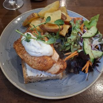 Left Bank Bistro - Tandoori chicken with bread, potatoes and salad - Seafood Near Me - Athlone, WH Left Bank Bistro - Tandoori chicken with bread, potatoes and salad - Seafood Near Me - Athlone, WH