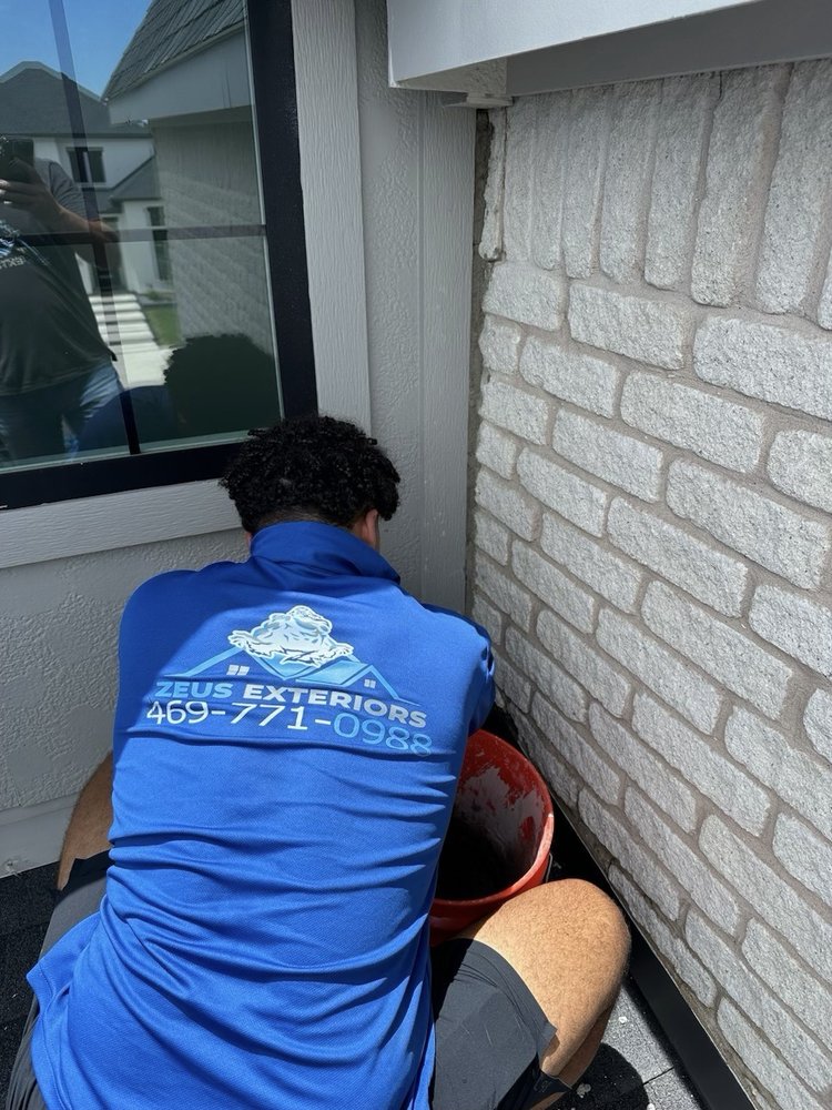 Slide of Zeus Exteriors